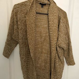 Brown and white sweater.